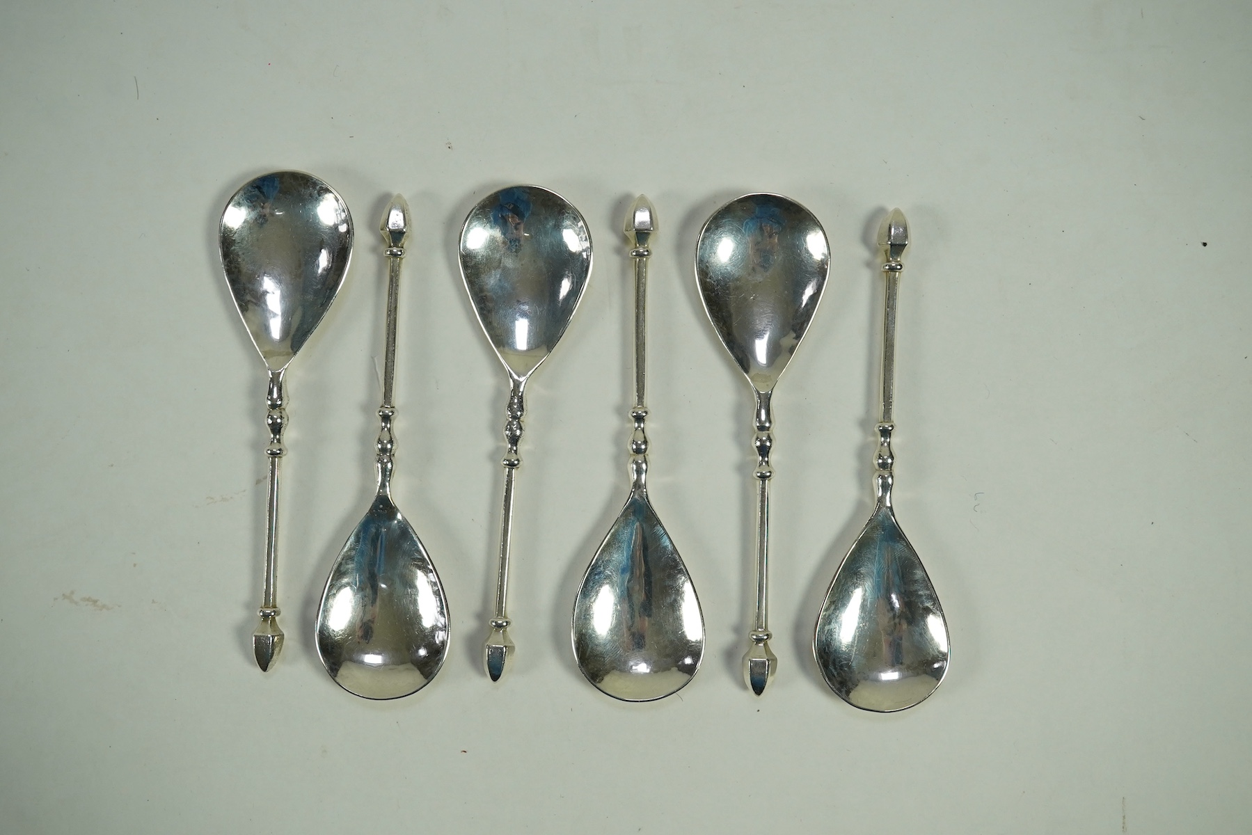 A set of six Elizabeth II Arts & Crafts silver Guild of Handicraft spoons